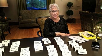 Joan Carman at reception table-sm